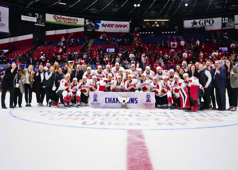 Team Canada poses for a team photo after winning their 13th gold medal at the 2024 IIHF Ice Hockey Women’s World Championships on April 14, 2024, in Utica, New York. Credit: Andre Ringuette